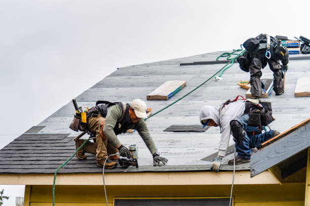 Professional Roofing technician working in Portola Valley, CA